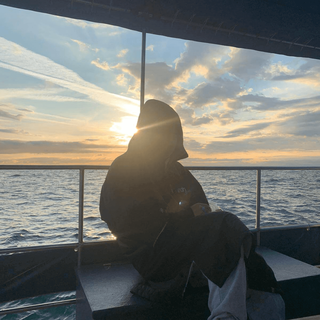 Arnold Dental Staff Member sitting and overlooking the sunset