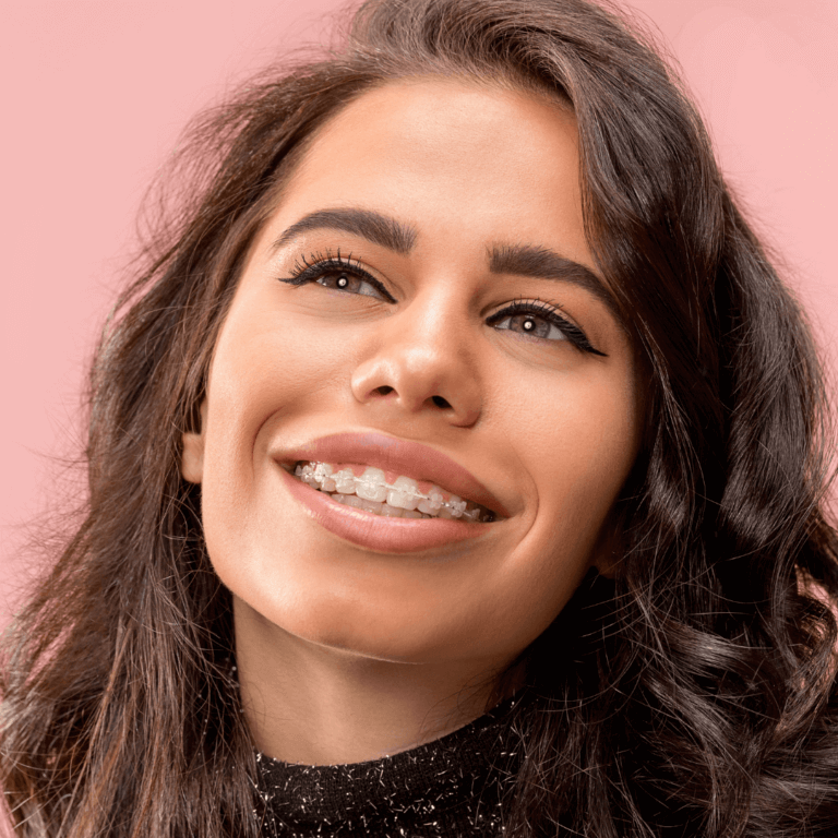Woman with braces smiling in Arnold