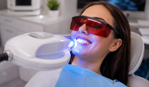 A person smiling, showing off natural-looking results while getting teeth whitening in Nottingham.